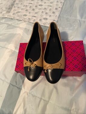 Tory Burch Tan and Black Cap-Toe Ballet Flats with Bow
